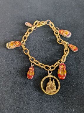 Gold-tone charm bracelet enamel Russian nesting doll matryoshka &  Cathedral